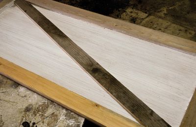 Cut the first slat of the X