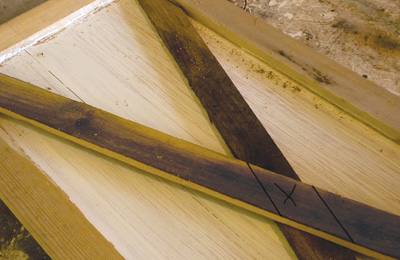 Cut the second slat of the X