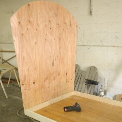 12. Attach the back panel to the coop. After the shape of the back 