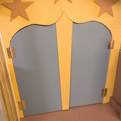 47. Attach the back doors. Paint the doors and attach them with hinges 