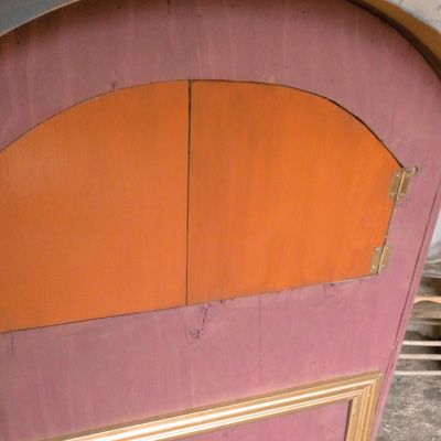 47. Attach the back doors. Paint the doors and attach them with hinges 