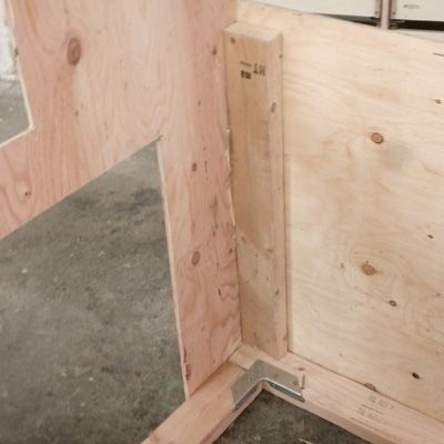Attach the end walls to the coop