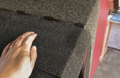 Trim the shingles at the roof edges