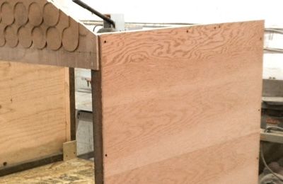 Attach plywood to the side walls
