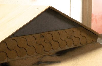 32. Paint the front gable. This coop includes a small sunrise motif (X 