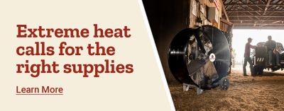 Extreme heat calls for the right supplies. Large industrial fan operating inside a barn and a person spraying water on a horse. Learn more.