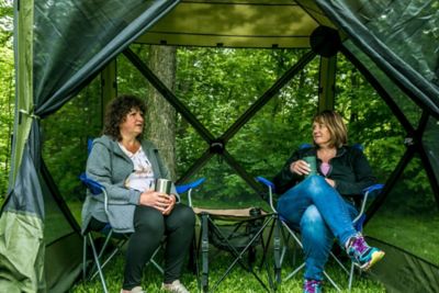 Image showing  36 sq. ft. Traveler 4-Sided Screen Shelter with Wind Panel Flaps, Brown/Tan Roof/Black Mesh