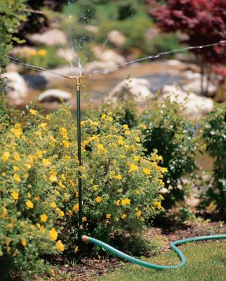 Image showing  1,432 sq. ft. 3-Arm Metal Telescoping Sprinkler on Metal Step Spike