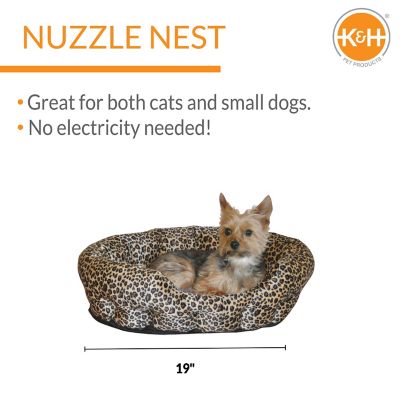Image showing  Self-Warming Nuzzle Nest Pet Bed