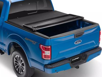 Image showing 2 th Lund 5.5 ft. Tri-Fold Tonneau Cover for 2007-2013 Chevrolet/GMC 1500/2500/3500, Black Vinyl