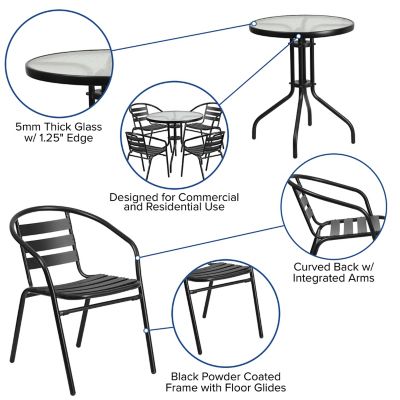 Image showing  5 pc. Round Glass Metal Table with 4 Black Metal Aluminum Slat Stack Chairs, 31.5 in.