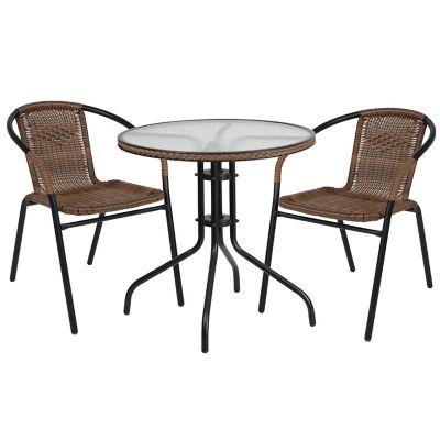 Image showing  3 pc. 28 in. Round Glass Metal Table with Rattan Edging and 2 Rattan Stack Chairs