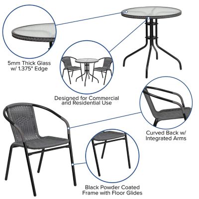Image showing  3 pc. 28 in. Round Glass Metal Table with Rattan Edging and 2 Rattan Stack Chairs