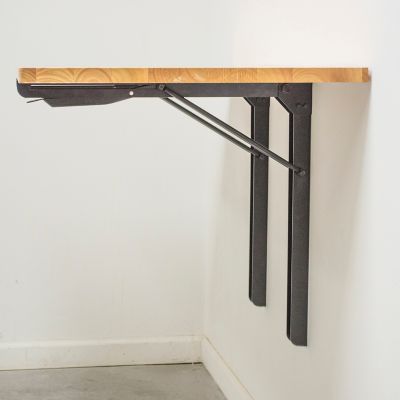 Image showing  23 in. x 47 in. Wall-Mounted Folding Workbench