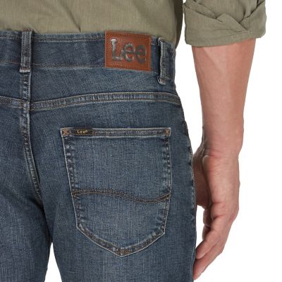 Image showing  Men's Classic Fit Mid-Rise Extreme Motion Bootcut Jeans