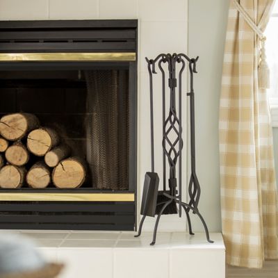 Image showing 6 th UniFlame Wrought-Iron Fireplace Tool Set with Center Weave Crook Handles, 28 in. H, Black, 5 pc.