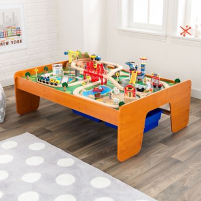Image showing  Ride Around Town Wooden Train Set and Table with Storage Bins, Honey, 100 pc.