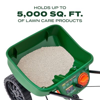 Image showing  5,000 sq. ft. Turf Builder EdgeGuard Mini Broadcast Spreader for Grass Seed, Fertilizer, Salt and Ice Melt