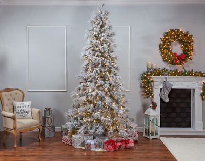 Image showing  9 ft. Pre-Lit Lightly Flocked Snowbell Pine Artificial Christmas Tree, Twinkling Lights