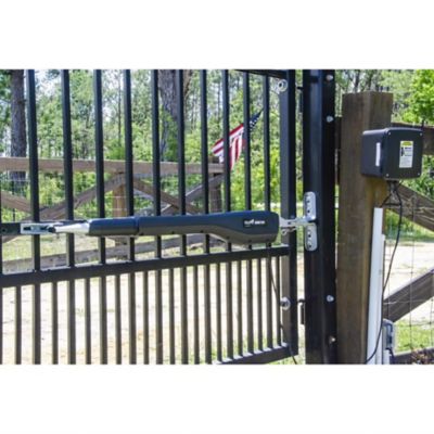 Image showing  Dual Swing Heavy-Duty Rancher Solar Panel Gate Opener Kit for Gates Up 18 ft. L or 850 lb. Per Gate Leaf