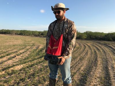 Image showing  15 lb. Motorized Handheld Spreader with Strap