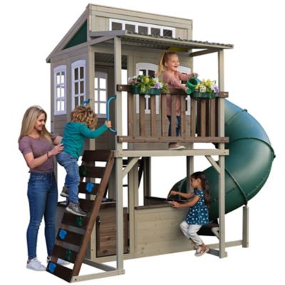 Image showing 5 th KidKraft Cozy Escape Wooden Playhouse with Slide, Rock Wall and Play Kitchen
