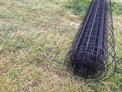 Image showing  100 ft. x 36 in. 14 ga. PVC-Coated Welded Wire Fence with 2 x 4in. Mesh, Black
