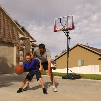 Image showing 7 th Lifetime Adjustable Portable Basketball Hoop, 52 in. Polycarbonate