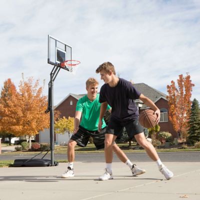 Image showing 7 th Lifetime Steel-Frame Shatterproof Portable Adjustable Basketball Hoop with Power Life, 54 in.