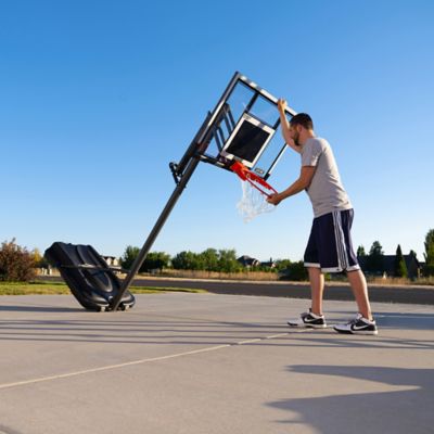 Image showing 8 th Lifetime Steel-Frame Shatterproof Portable Adjustable Basketball Hoop with Power Life, 54 in.
