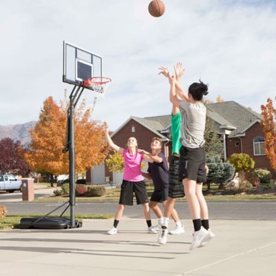 Image showing 9 th Lifetime Steel-Frame Shatterproof Portable Adjustable Basketball Hoop with Power Life, 54 in.