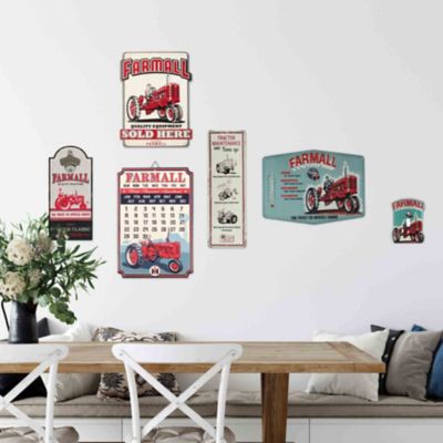 Image showing  International Harvester Perpetual Calendar Embossed Metal Sign