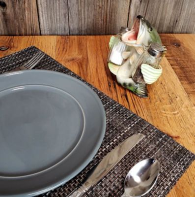 Image showing  Bass Holding Salt and Pepper Shakers