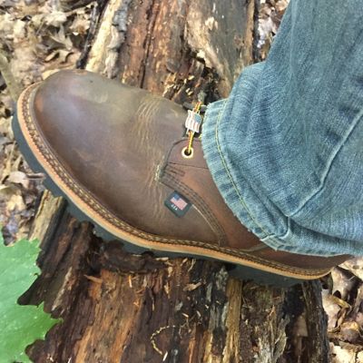 Image showing 5 th Thorogood Men's Steel Toe USA Insulated Safety Logger Waterproof Work Boots, Storm Welt Construction, 9 in.