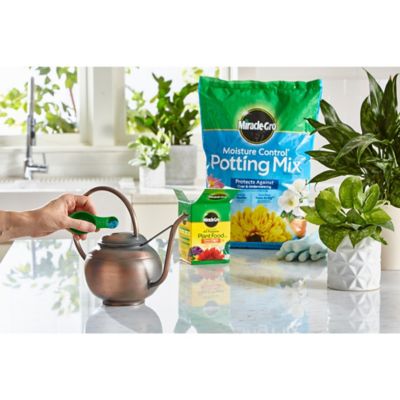 Image showing  8 qt., 1.5 lb. Moisture Control Potting Mix and Water Soluble All-Purpose Plant Food