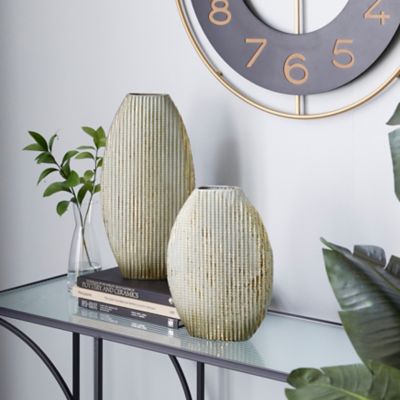 Harper & Willow 2 pc. Oval Textured Metal Vase Set with White and Gold Glazed Finish, 12 in. and 16 in.