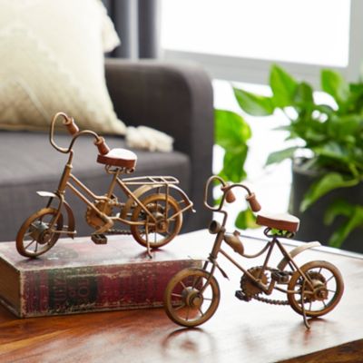 Harper & Willow 11 in. x 8 in. Natural Wood and Gold Metal Vintage Bicycle Sculptures, 2 pc.