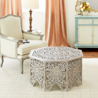 Harper & Willow Gray-Washed Decorative Carved Wood Coffee Table, 33 in. x 18 in.