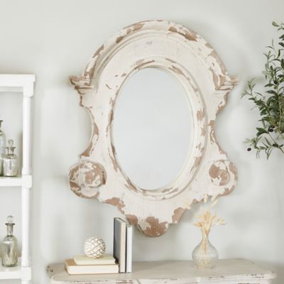 Harper & Willow White Fiberglass Carved Oval Wall Mirror with Arched Top and Distressing 35" x 5" x 43", 14820