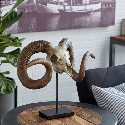 Harper & Willow 22 in. x 17 in. Large Sheep Skull Sculpture with Horns on Stand