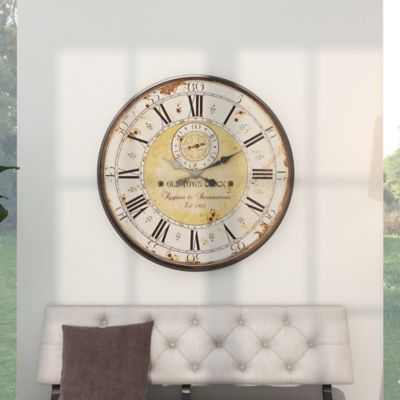 Harper & Willow Brown Wooden Distressed Wall Clock with Typography 32" x 1" x 32" Made very well! If you want a large clock this is the one