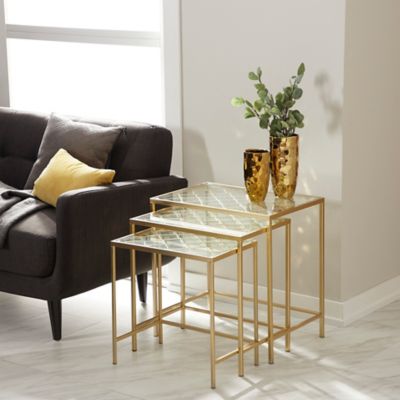 Harper & Willow 3 pc. Metallic Metal and Glass Nesting Accent Table Set with Quatrefoil Grid Pattern, Gold