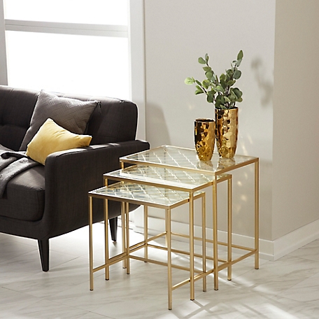 Harper & Willow Metallic Gold Metal and Glass Nesting Accent Tables with Quatrefoil Grid Pattern, 3 pc.