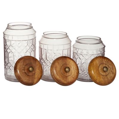 Image showing  Assorted Large Round Clear Glass Textured Patterned Jars with Wood Lids Set, 3 pc.