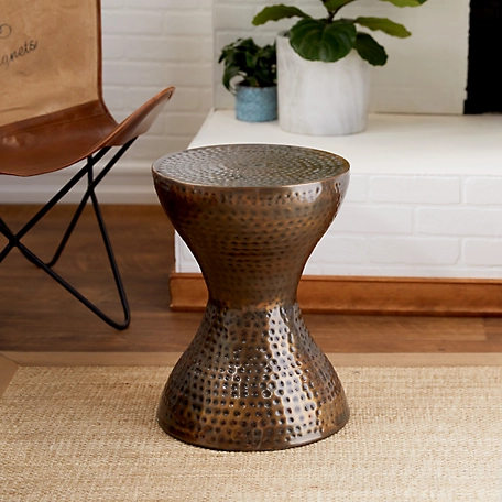 Harper & Willow Bronze Metal Hammered Accent Table with Hourglass Shape 14 in. x 14 in. x 19 in.