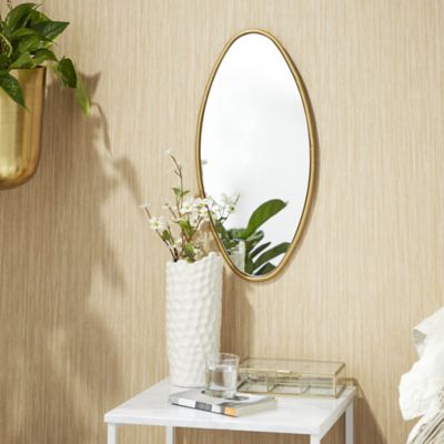 Harper & Willow Gold Metal Wall Mirror with Varying Shapes Set of 4 20 in., 16 in., 21 in., 24 in. H