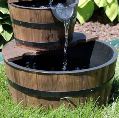 Image showing 7 th Sunnydaze Decor 23 in. H Electric Fir Wood 2-Tier Farmhouse Barrel with Decorative Hand Pump Outdoor Water Fountain, DSL-079