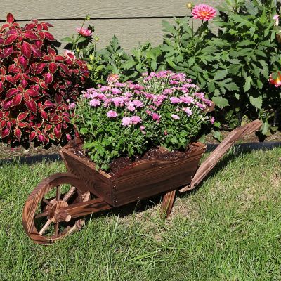 Image showing  Wooden Decorative Wheelbarrow Planter for Patio, Lawn and Garden - 35 in. L x 10 in. W x 11 in. - Brown