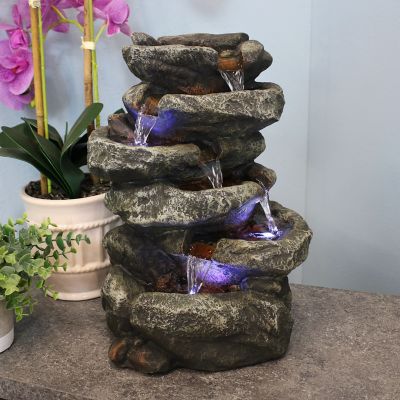 Image showing 1 th Sunnydaze Decor Indoor Home Office Relaxing 6-Tiered Stone Falls Tabletop Water Fountain with LED Lights, 15 in.