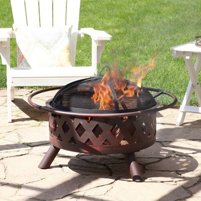 Image showing  Outdoor Camping or Backyard Crossweave Cut Out Fire Pit with Spark Screen and Log Poker - 30 in. - Bronze